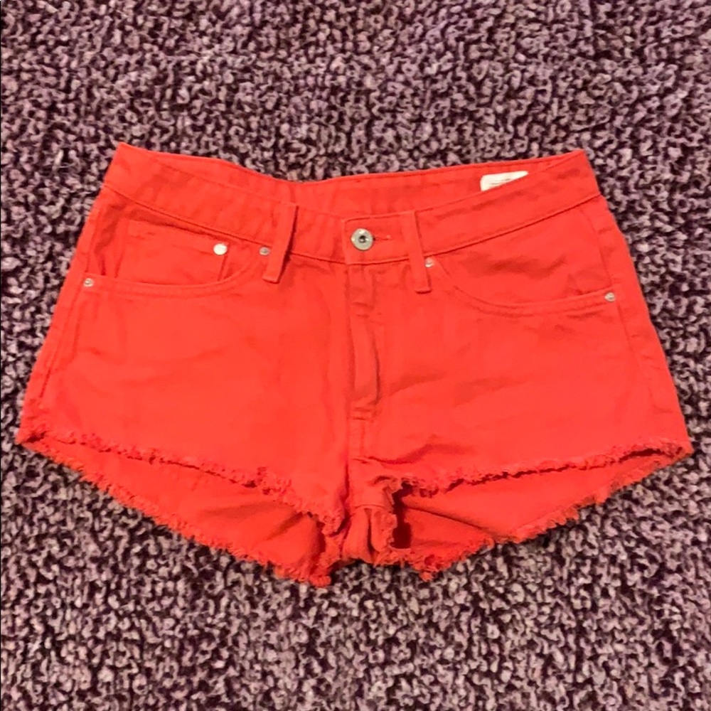 Orange denim shorts